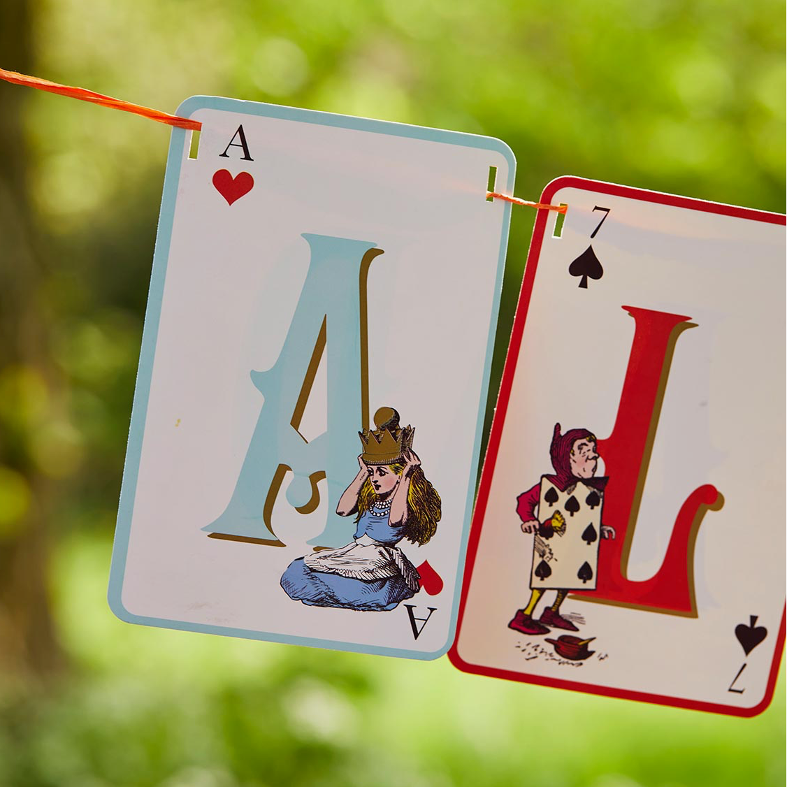 The Canton Christmas Shop Alice in Wonderland Curiously Mad Bunting with Playing Card Letters and Characters from the movie