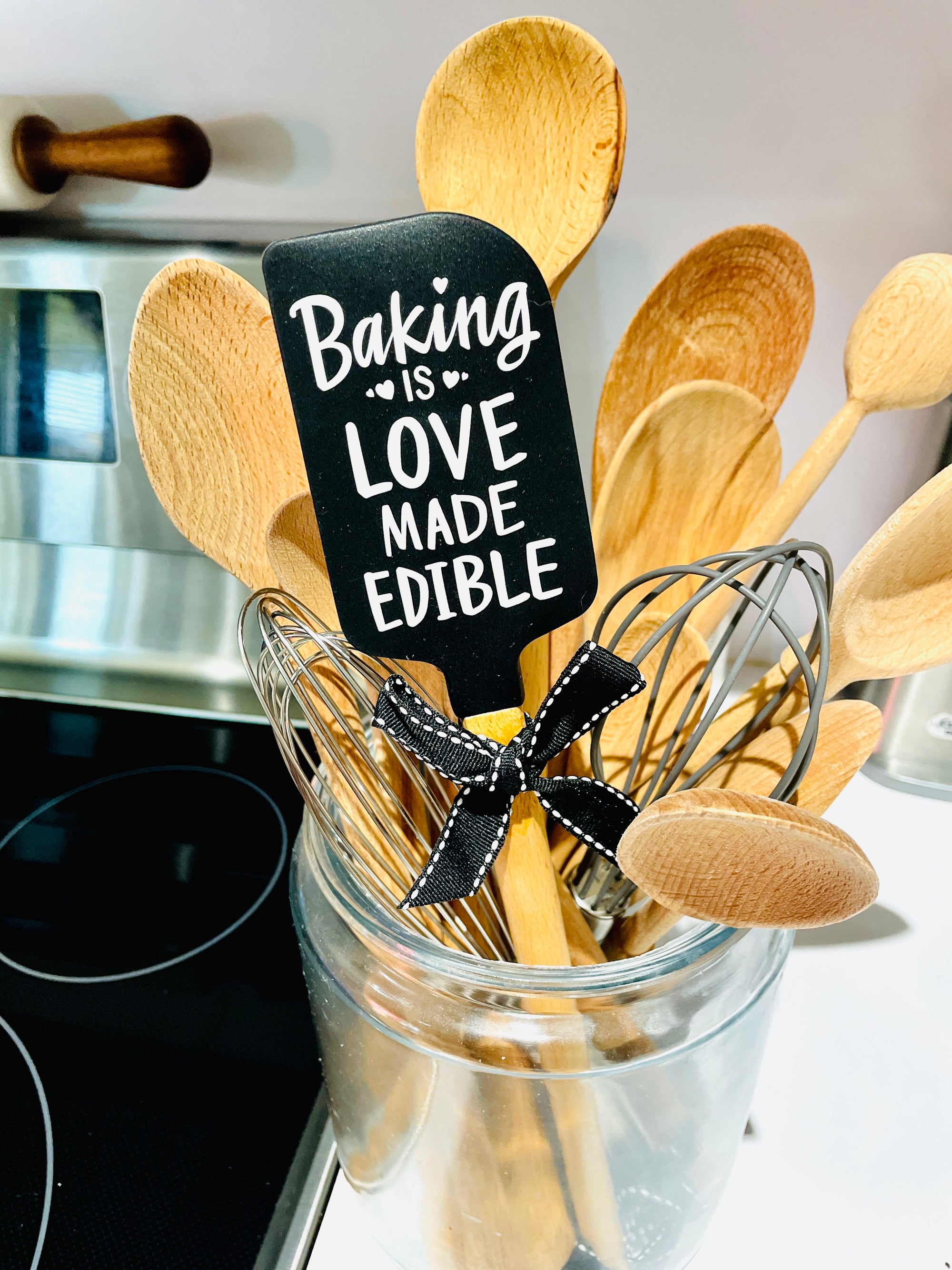 The Canton Christmas Shop Baking Is Love Made Edible Black Silicone Spatula with Wood Handle and Gift Bow Ribbon with Hanging Loop