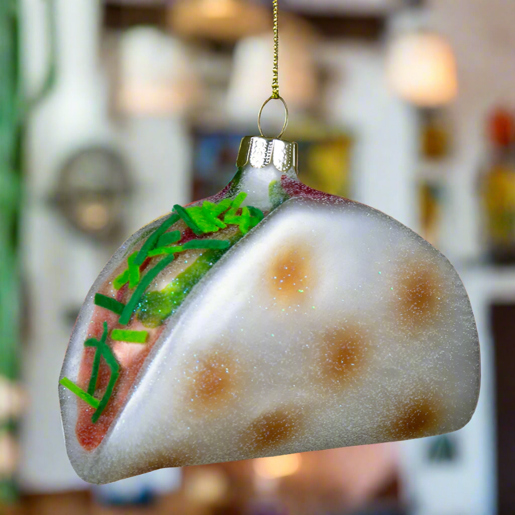 The Canton Christmas Shop Big Taco Glass Ornament in a mexican restaurant with Texas Tex Mex food