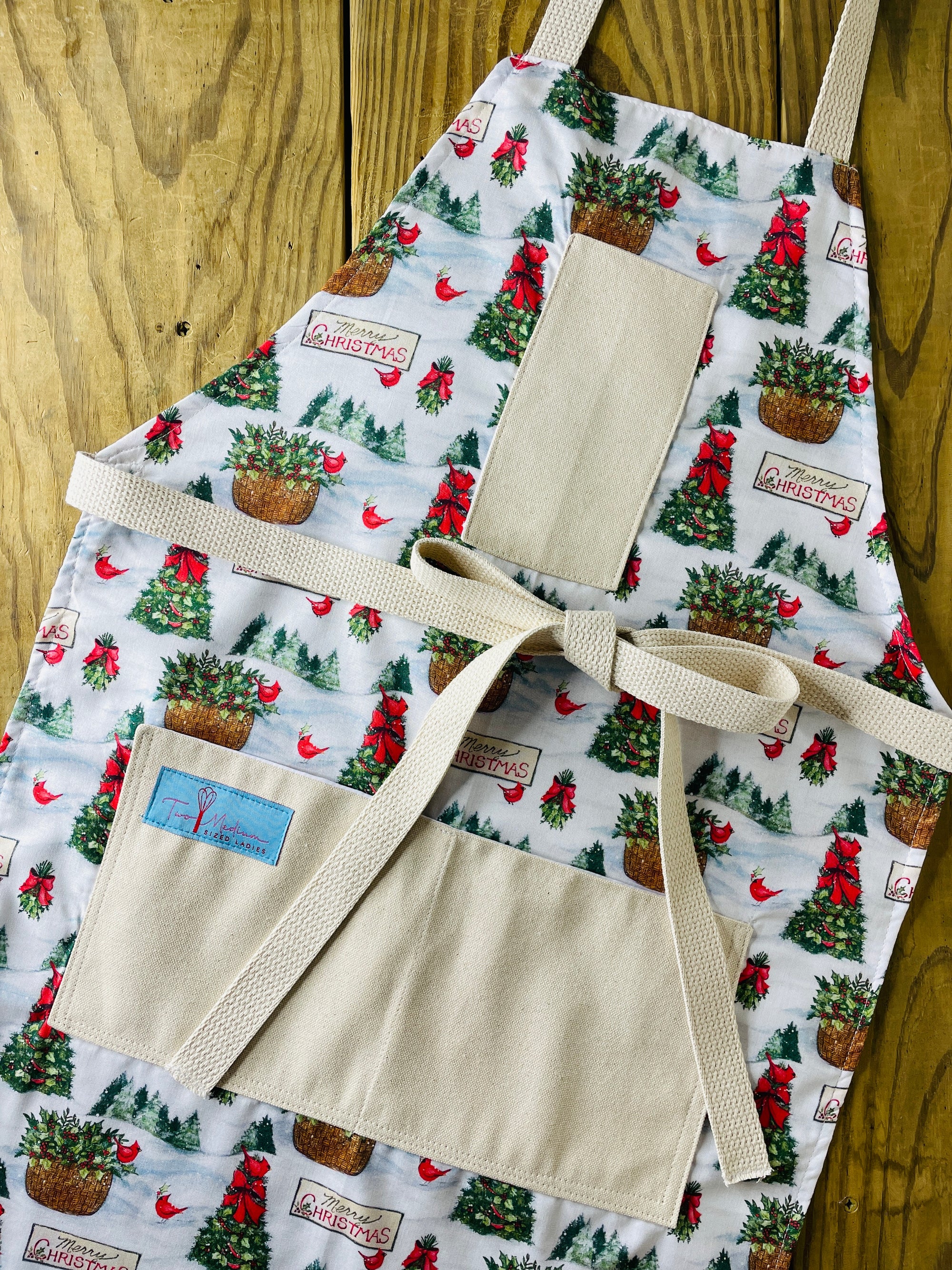 The Canton Christmas Shop Christmas Forest Apron Merry Christmas Trees Cardinal Holly by Two Medium Sized Ladies
