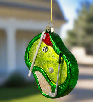 The Canton Christmas Shop Golf Course Ornament in front of a country club