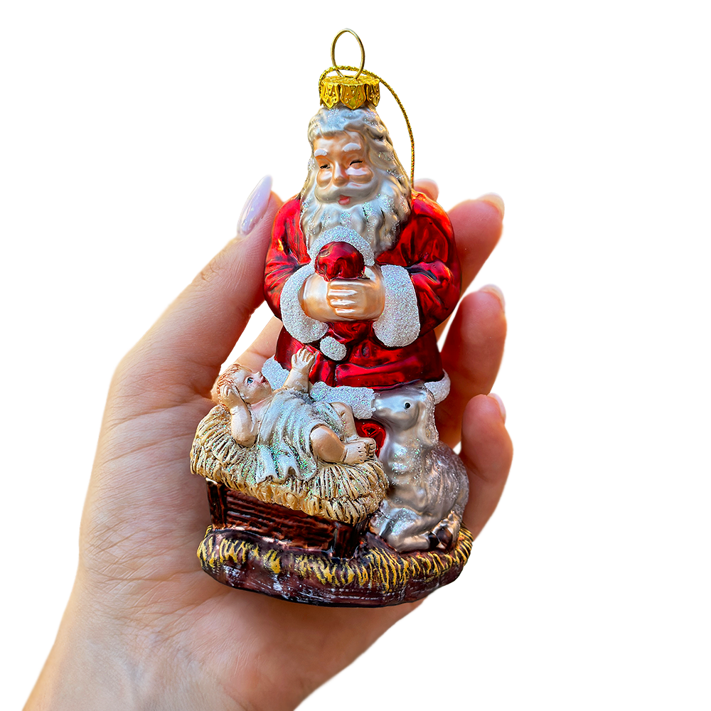 The Canton Christmas Shop Santa Kneeling by Jesus in Manger Glass Ornament Nativity Savior of the World Lamb of God