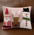 The Canton Christmas Shop Santa and Friends Hooked Throw Pillow for Christmas featuring Santa Reindeer Snowman with Pink Background