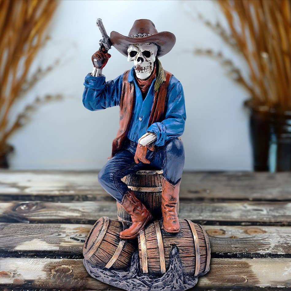 The Canton Christmas Shop skeleton gunslinger old west figurine oil man revolver cowboy cigar smoking