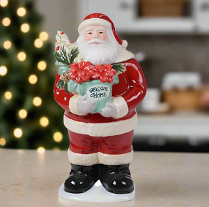 The Canton Christmas Shop Welcome Home Santa Cookie Jar Holding Poinsettia Flowers