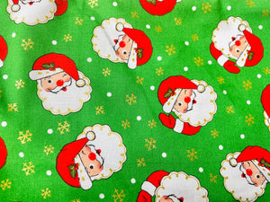 The Canton Christmas Shop Winking Santa Christmas Apron by Two Medium Sized Ladies fabric pattern