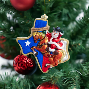 The Canton Christmas Shop Glass Texas Santa Handpainted Ornament by Kurt Adler 4 1/2" glass ornament hanging on Christmas Tree