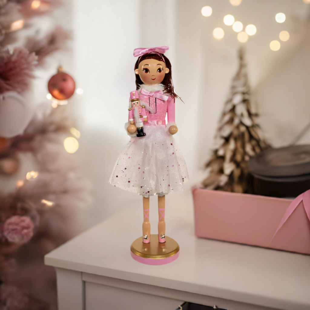 The Canton Christmas Shop 12" Clara Brunette Ballerina Nutcracker in bedroom