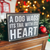 The Canton Christmas Shop A Dog Wags its tail with its heart box sitter sign at christmas