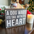 The Canton Christmas Shop A Dog Wags its tail with its heart box sitter sign at christmas
