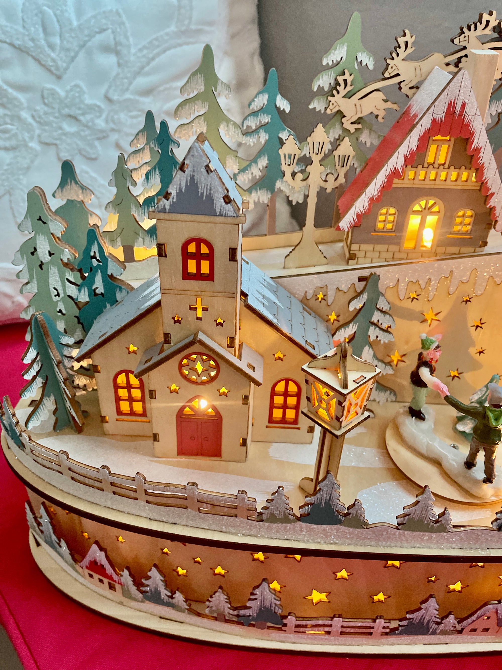 The Canton Christmas Shop Kurt Adler 11.2" Battery Operated Light Up Christmas Village with Santa in living room
